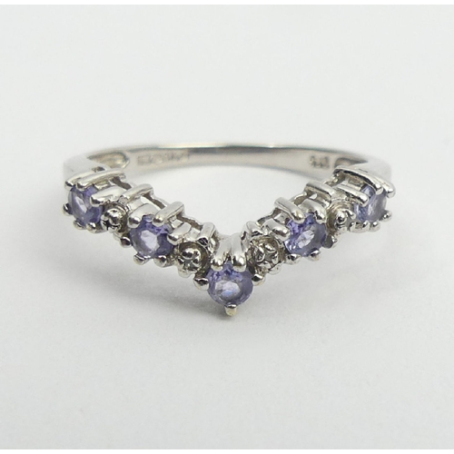 21 - 9ct white gold tanzanite and diamond ring, 1.8 grams, 3.3mm, size M1/2. UK postage £12