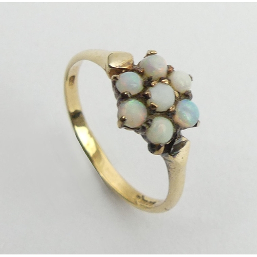 22 - 9ct gold opal seven stone ring,1.7 grams, 9.3mm, size N, UK postage £12.