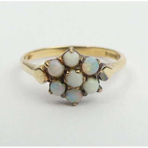 22 - 9ct gold opal seven stone ring,1.7 grams, 9.3mm, size N, UK postage £12.