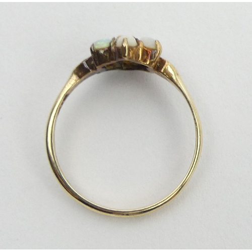 22 - 9ct gold opal seven stone ring,1.7 grams, 9.3mm, size N, UK postage £12.