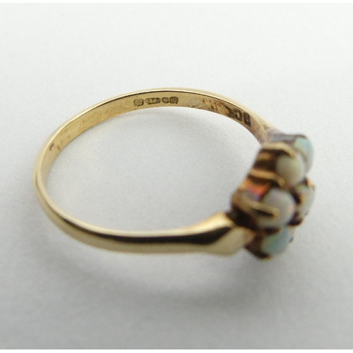 22 - 9ct gold opal seven stone ring,1.7 grams, 9.3mm, size N, UK postage £12.