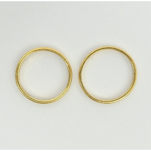 24 - Two 22ct gold wedding rings, 4.7 grams, size L & L1/2, UK postage £12.