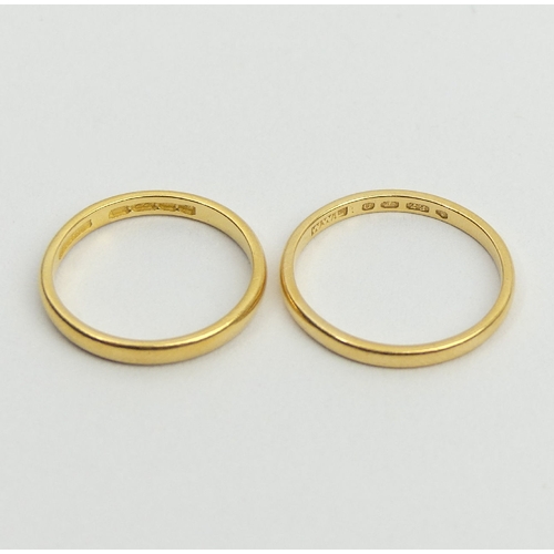 24 - Two 22ct gold wedding rings, 4.7 grams, size L & L1/2, UK postage £12.