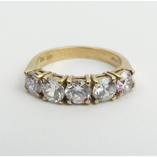 6 - 9ct gold five stone ring, 3.5 grams, 4.6mm, size K. UK postage £12.