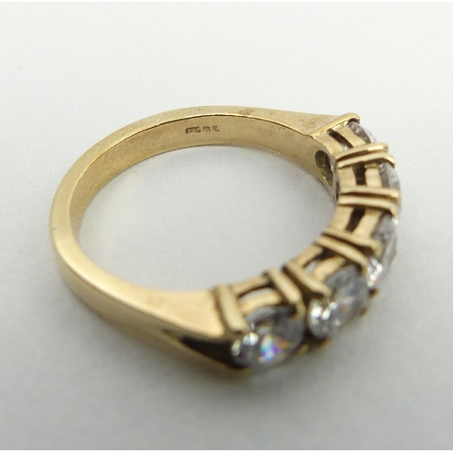 6 - 9ct gold five stone ring, 3.5 grams, 4.6mm, size K. UK postage £12.