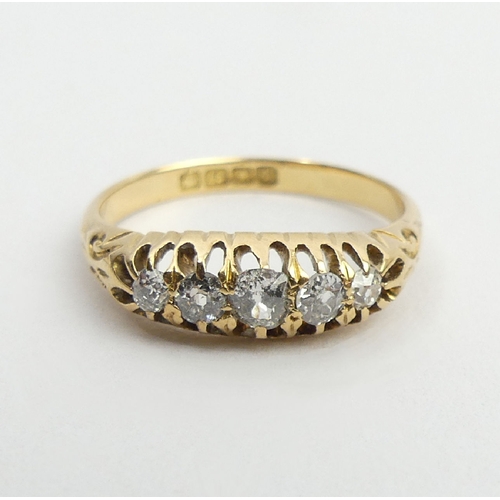 25 - Edwardian 18ct gold five stone diamond ring, London 1906, 2.9 grams, 5.6mm, size M1/2. UK postage £1... 