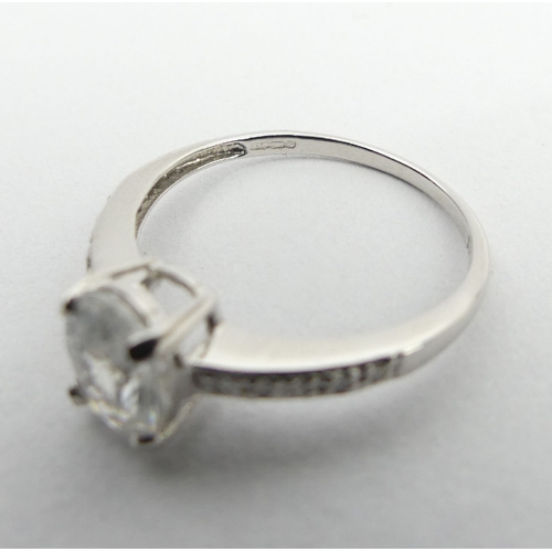 52 - 9ct white gold topaz and diamond ring, 1.9 grams, 8mm, size N1/2. UK Postage £12.