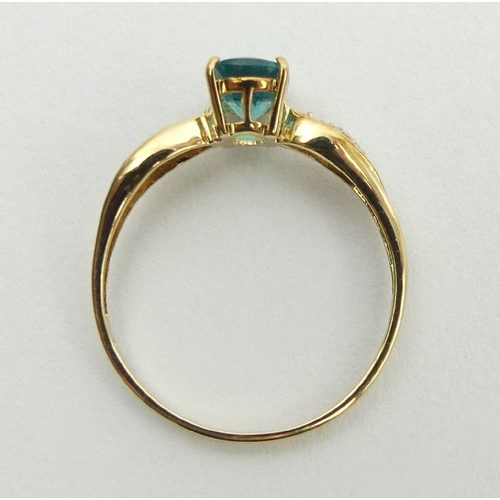 54 - 9ct gold blue stone and diamond ring, 1.2 grams, 6.9mm, size N1/2. UK Postage £12.