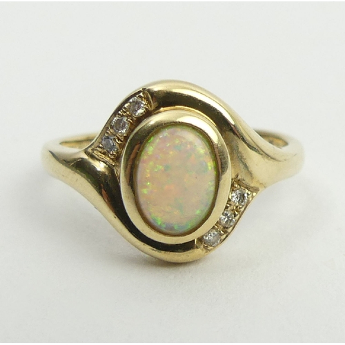 55 - 9ct gold opal and diamond ring, 2.6 grams, 12.3mm, size M1/2. UK Postage £12.