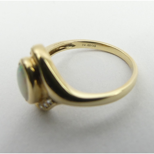 55 - 9ct gold opal and diamond ring, 2.6 grams, 12.3mm, size M1/2. UK Postage £12.