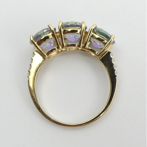 57 - 9ct gold mystic topaz and diamond ring, 3.2 grams, 7mm, size N. UK Postage £12.