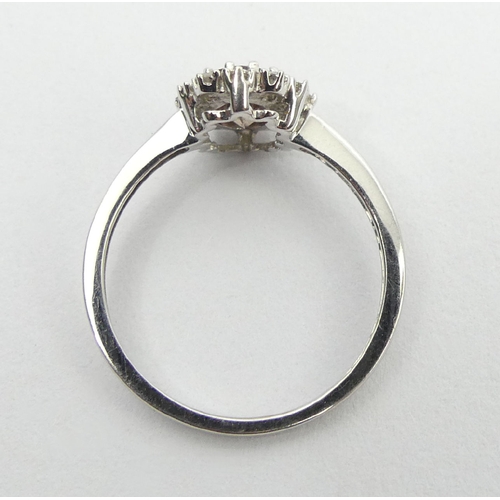 59 - 9ct white gold tourmaline and diamond ring, 2.1 grams, 10.2mm, size N1/2. UK Postage £12.