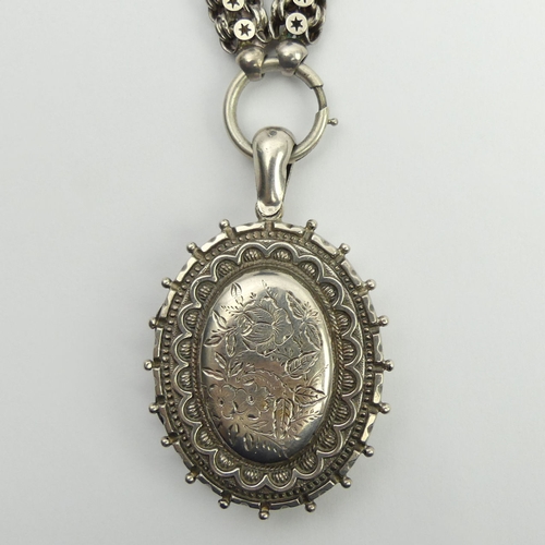 70 - Victorian silver locket pendant and chain, 44 grams, Birm. 1881, chain 9.3mm x 47cm, locket 6.2cm. U... 