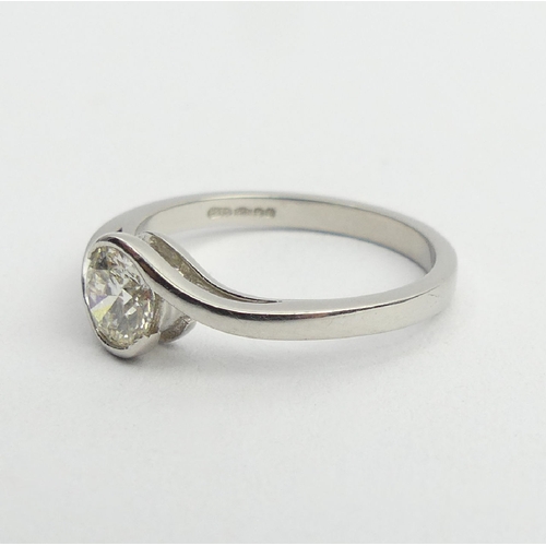 75 - 18ct white gold diamond ring, approx .7ct, 3.4 grams, 6.2mm, size L. UK Postage £12.