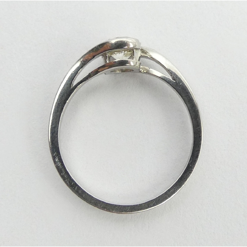 75 - 18ct white gold diamond ring, approx .7ct, 3.4 grams, 6.2mm, size L. UK Postage £12.