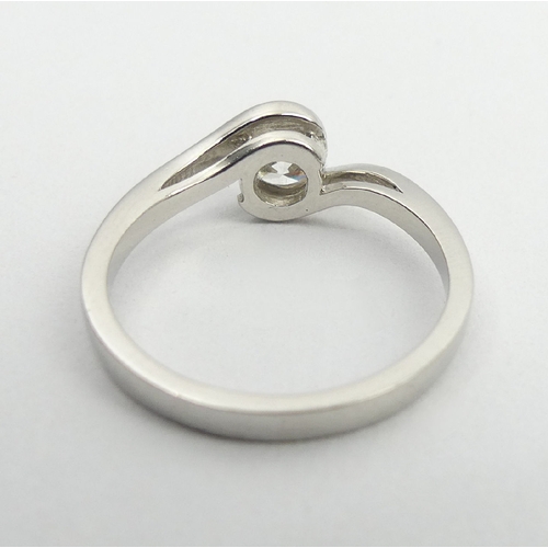 75 - 18ct white gold diamond ring, approx .7ct, 3.4 grams, 6.2mm, size L. UK Postage £12.