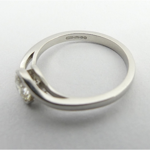 75 - 18ct white gold diamond ring, approx .7ct, 3.4 grams, 6.2mm, size L. UK Postage £12.