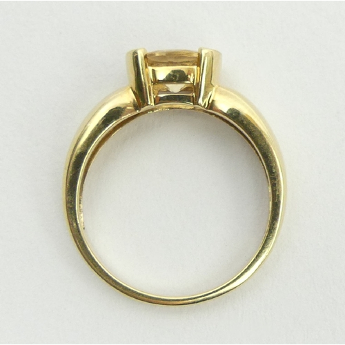 76 - 9ct gold yellow topaz single stone ring, 2.8 grams, 5.2mm, size N. UK Postage £12.