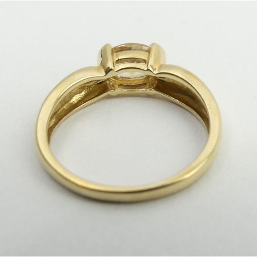 76 - 9ct gold yellow topaz single stone ring, 2.8 grams, 5.2mm, size N. UK Postage £12.