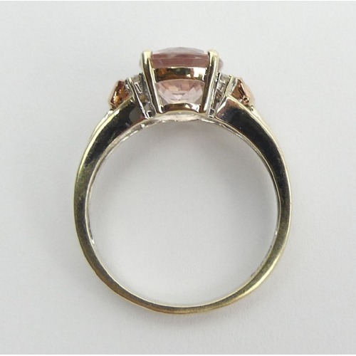 78 - 9ct gold pink quartz with red gold flowers and diamond ring, 2.7 grams, 9.9mm, size N. UK Postage £1... 