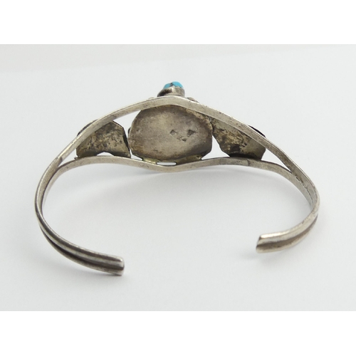 79 - Native American sterling silver and turquoise cuff bangle, 17.7 grams, 25mm. UK Postage £12.