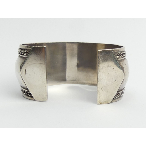 80 - Native American sterling silver floral engraved cuff bangle, 83.8 grams, 35mm. UK Postage £12.