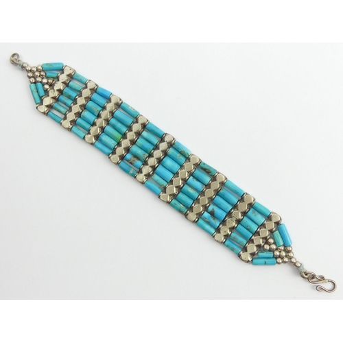 82 - Native American sterling silver and turquoise bracelet, 52 grams, 19cm x 2.5cm. UK Postage £12.