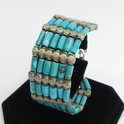 82 - Native American sterling silver and turquoise bracelet, 52 grams, 19cm x 2.5cm. UK Postage £12.