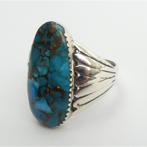 90 - Native American sterling silver turquoise set ring, 9.1 grams, 27mm, size T. UK Postage £12.