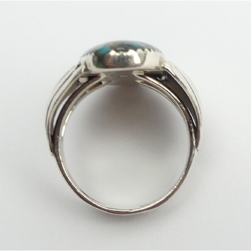 90 - Native American sterling silver turquoise set ring, 9.1 grams, 27mm, size T. UK Postage £12.