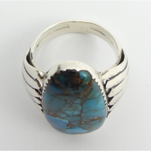 90 - Native American sterling silver turquoise set ring, 9.1 grams, 27mm, size T. UK Postage £12.