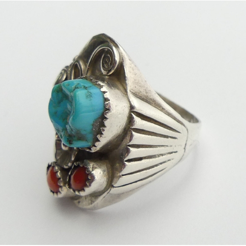 91 - Native American sterling silver turquoise and coral ring, 24.4 grams, 32mm, size U. UK Postage £12.