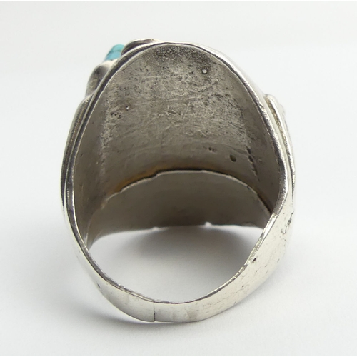 91 - Native American sterling silver turquoise and coral ring, 24.4 grams, 32mm, size U. UK Postage £12.