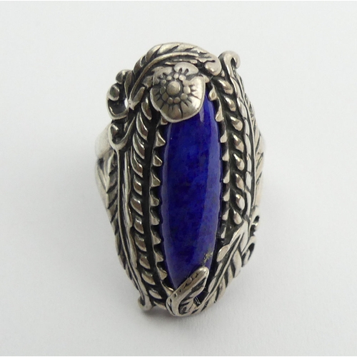 92 - Native American sterling silver and lapis ring, 12 grams, 30mm, size N. UK Postage £12.