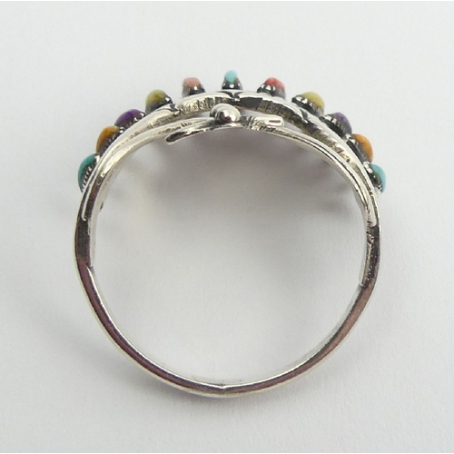 94 - Native American sterling silver multi-coloured stone set ring, signed H.W., 3.7 grams, 17.5mm, size ... 