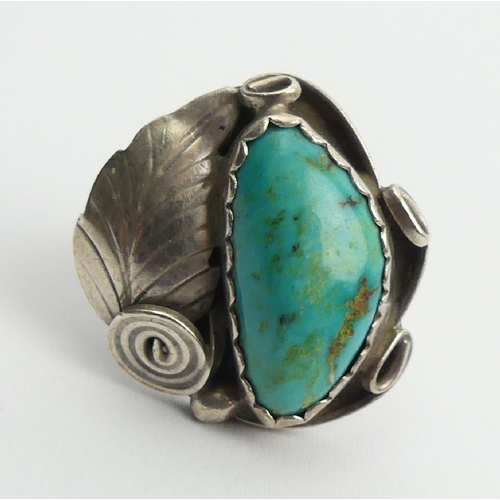 95 - Native American silver and turquoise set ring, signed R.L., 7.3 grams, 24mm, size M1/2. UK Postage £... 