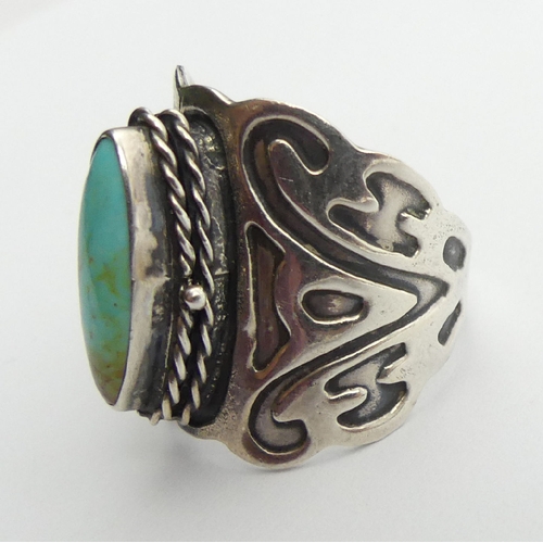 98 - Native American sterling silver and turquoise ring, 9 grams, 24mm, size N. UK Postage £12.