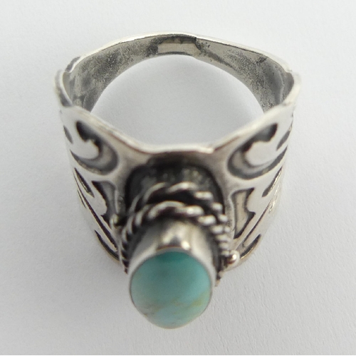 98 - Native American sterling silver and turquoise ring, 9 grams, 24mm, size N. UK Postage £12.