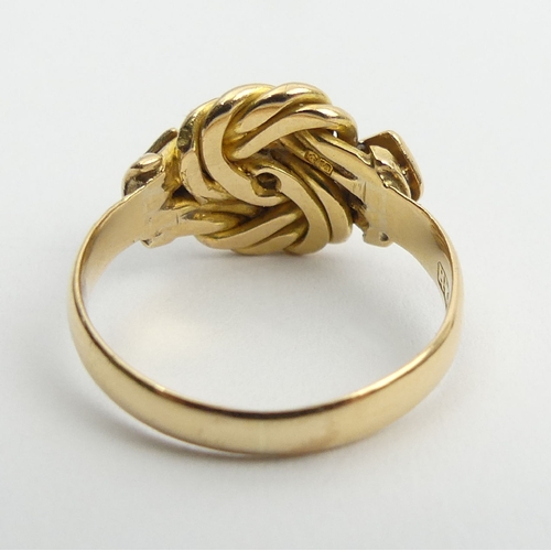 101 - 18ct gold diamond set knot ring, London 1918, 4.5 grams, 10.6mm, size L. UK Postage £12.