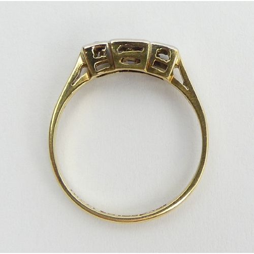 106 - 18ct gold and platinum diamond three stone ring, 2.4 grams, 4.9mm, size O. UK Postage £12.