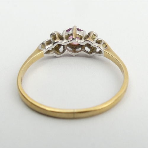 109 - 9ct gold, ruby and diamond ring, 1.2 grams, 5.1mm, size N. UK Postage £12.