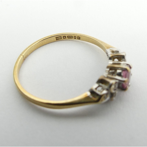 109 - 9ct gold, ruby and diamond ring, 1.2 grams, 5.1mm, size N. UK Postage £12.