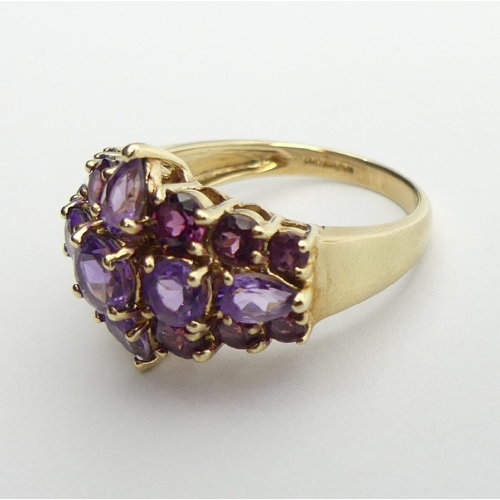 110 - 9ct gold, pink tourmaline and amethyst dress ring, 4.9 grams, 15.6mm, size P. UK Postage £12.