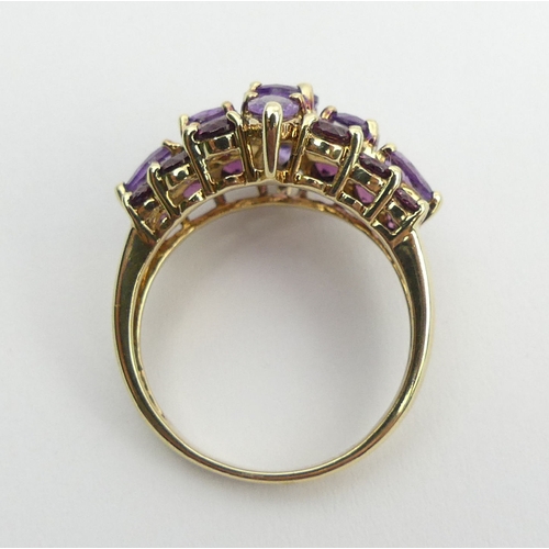 110 - 9ct gold, pink tourmaline and amethyst dress ring, 4.9 grams, 15.6mm, size P. UK Postage £12.