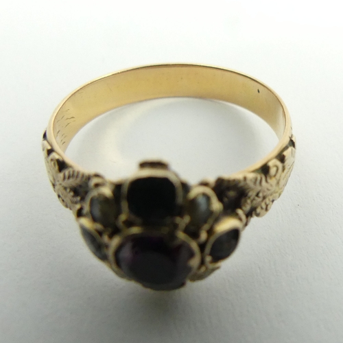 113 - Victorian 15ct garnet and seed pearl ring, London 1874, 2.9 grams, 10.6mm, size M.