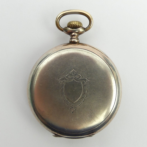 117 - Swiss open face silver top wind pocket watch with gold highlights, 50 x 67 mm. UK Postage £12.