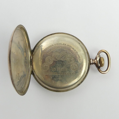 117 - Swiss open face silver top wind pocket watch with gold highlights, 50 x 67 mm. UK Postage £12.