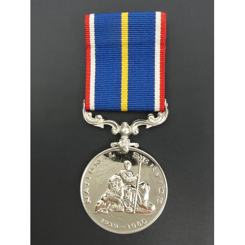 203 - 1939 - 1960 National Service Medal No 58327. UK Postage £12.