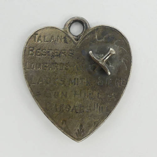 210 - Unusual Boer War heart pendant with dagger piercing and battles to one side, the other with protrudi... 