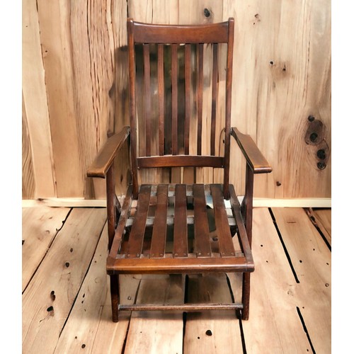 398 - Edwardian stained beech folding steamer chair. 96cm high. Collection only.